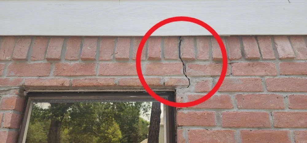 Brick veneer settlement crack noted during an inspection